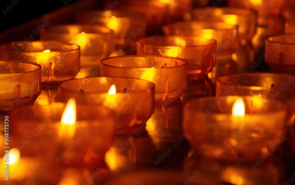 many burning tealights closeup many burning tealights closeup
