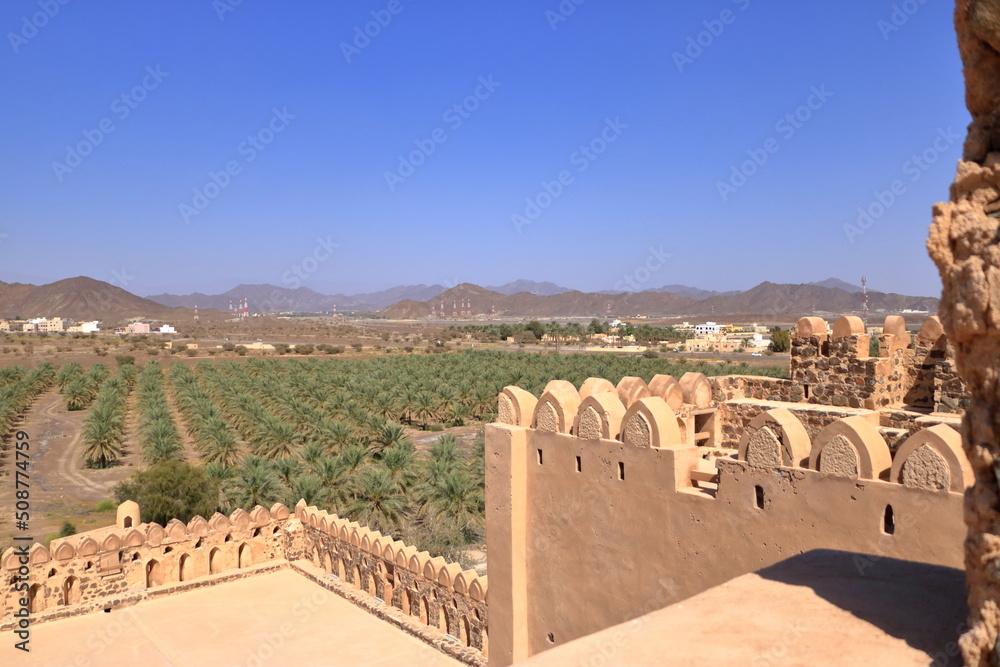 Fort Jabreen Castle beautiful historic castle in Oman, with palm trees view