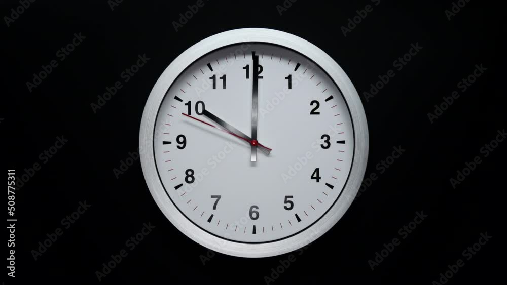 Black Arrows And Red Second Hand Of Grey Wall Clock. Black Background. Wall Clock Face Beginning Of Time Of 10.00 Am Or Pm. 4k. ProRes. Black Arrows And Red Second Hand Of Grey Wall Clock. Black Background. Wall Clock Face Beginning Of Time Of 10.00 Am Or Pm. 4k. ProRes.