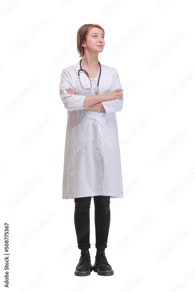 Front view of attractive happy smiling female doctor physician nurse standing with arms crossed Front view of attractive happy smiling female doctor physician nurse standing with arms crossed