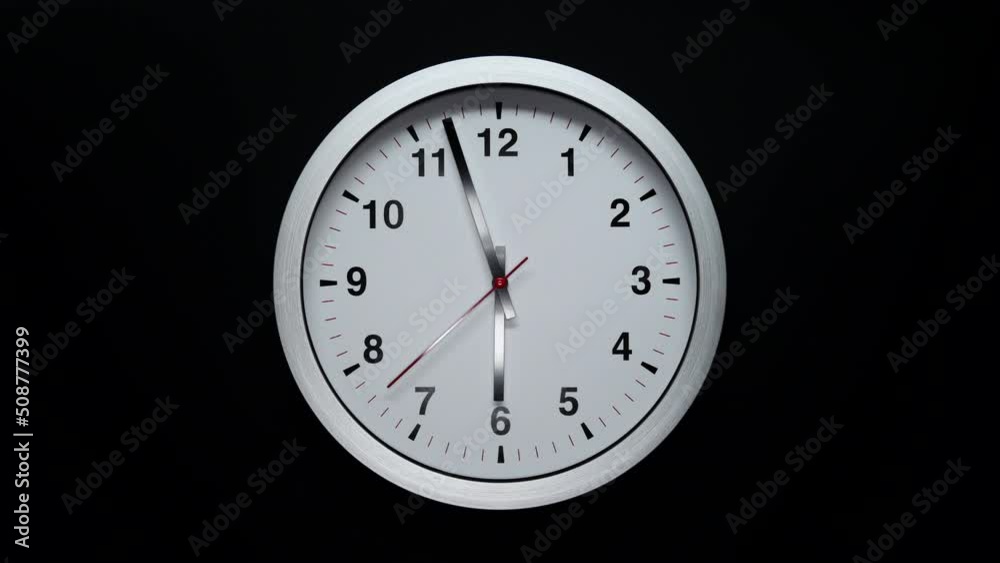 Grey Wall Clock With A Black Arrows And Red Second Hand On Black Background. Wall Clock Face Of Time Of 6.00 Am Or Pm. 4k. ProRes. Timelapse. Grey Wall Clock With A Black Arrows And Red Second Hand On Black Background. Wall Clock Face Of Time Of 6.00 Am Or Pm. 4k. ProRes. Timelapse.