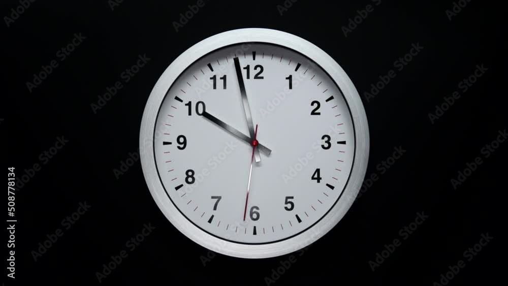 Grey Wall Clock With A Black Arrows And Red Second Hand On Black Background. Wall Clock Face Of Time Of 10.00 Am Or Pm. 4k. ProRes. Timelapse. Grey Wall Clock With A Black Arrows And Red Second Hand On Black Background. Wall Clock Face Of Time Of 10.00 Am Or Pm. 4k. ProRes. Timelapse.