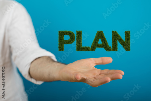 green plan word in hand