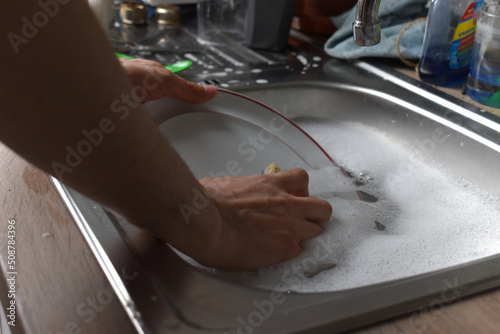 washing dishes in kitchen