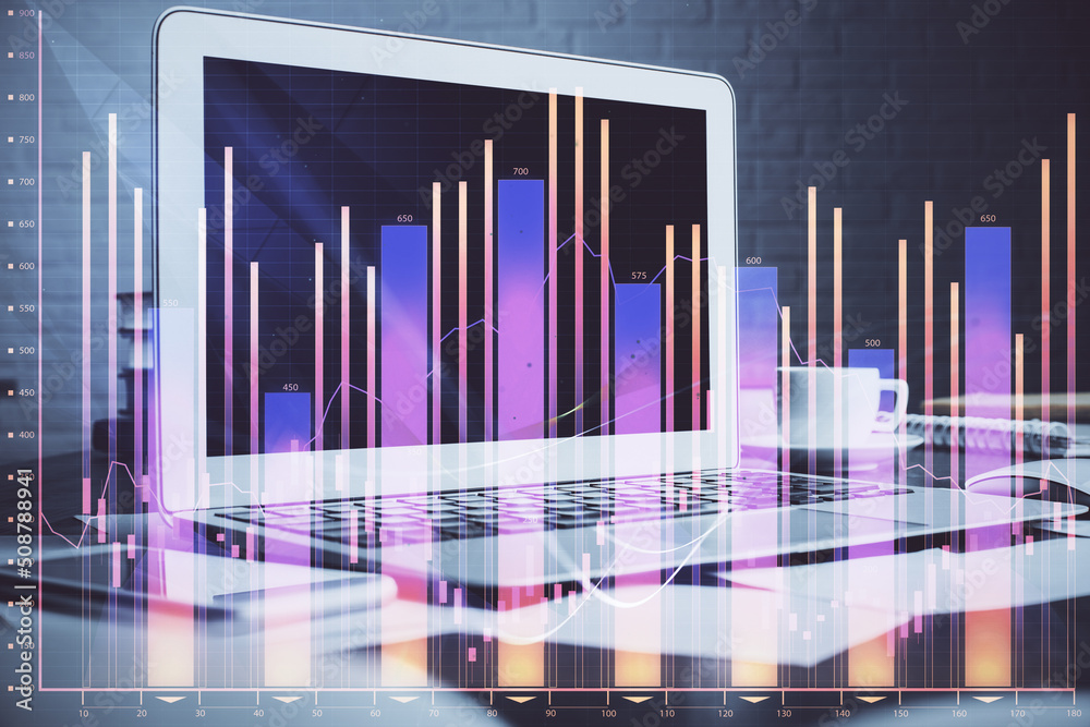 Forex market graph hologram and personal computer on background. Double exposure. Concept of investment.