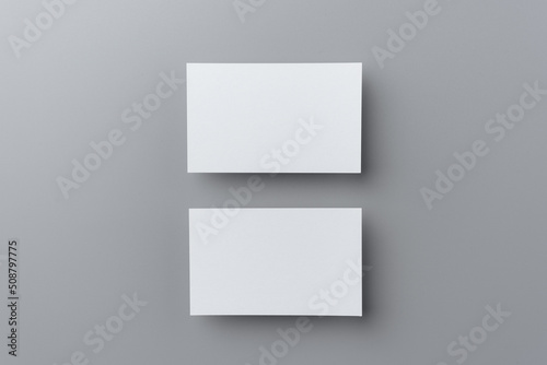 two business card isolated on grey background