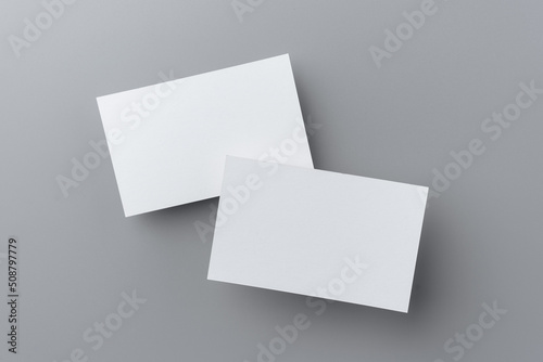 two business card isolated on grey background