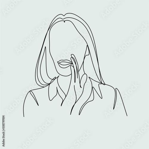 girl tells the secret of one line. hand near mouth
