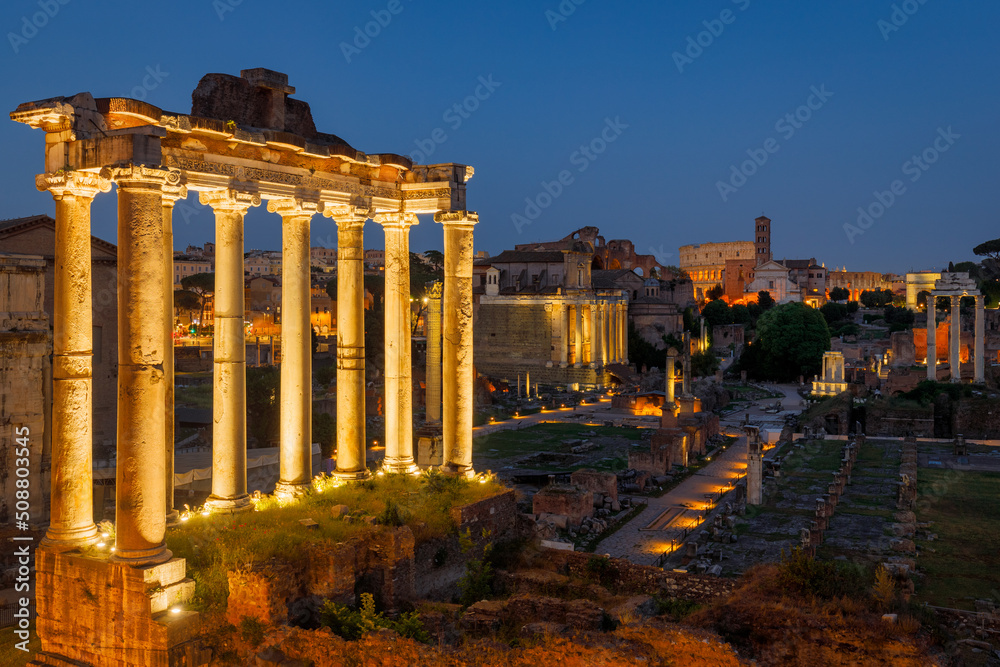 The Roman Forum (latin name Forum Romanum) at night, plaza of the ancient roman ruins at the center of the city of Rome, Italy, Europe.