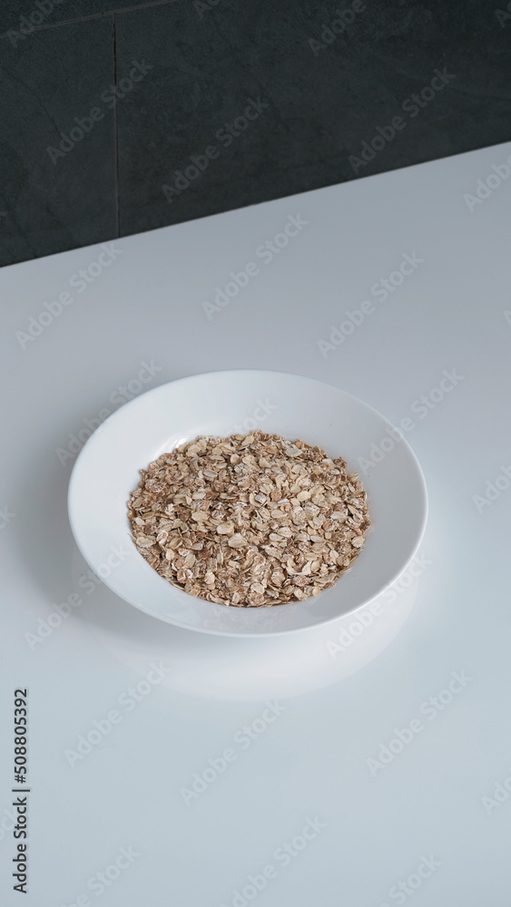Bowl with healthy food on the table. Bowl with oatmeal porridge. Bowl with healthy food on the table. Bowl with oatmeal porridge.