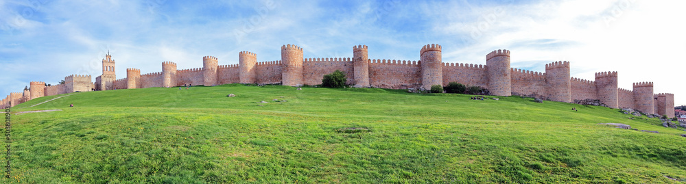 Panoramic view on the battlements and walls surrounding the old town of Avila, Spain, the highest city on the Spanish meseta  