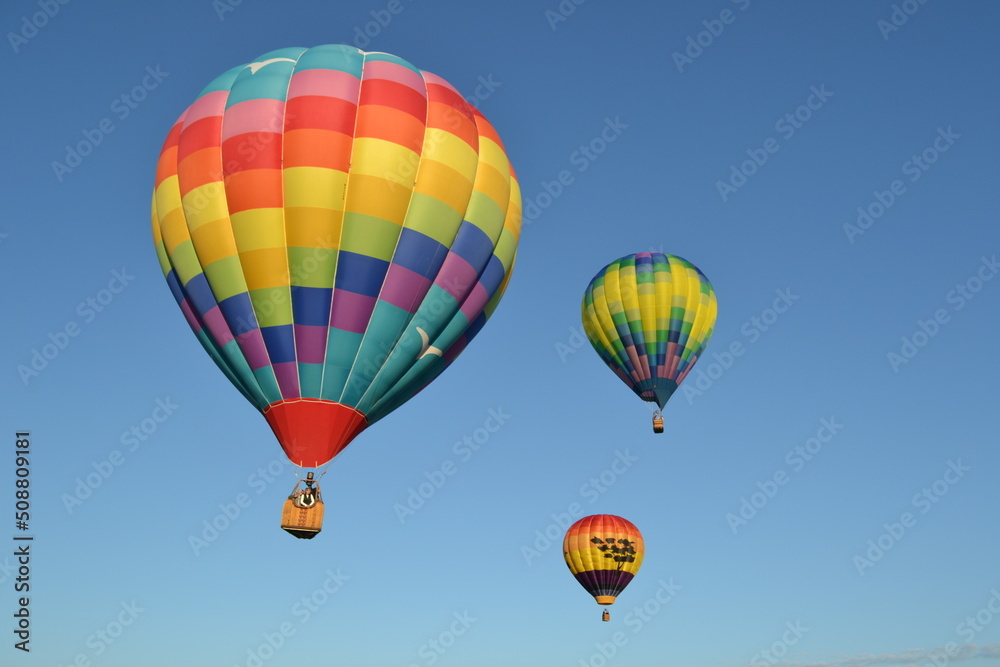 Colorful hot air balloons launching into the sky Colorful hot air balloons launching into the sky