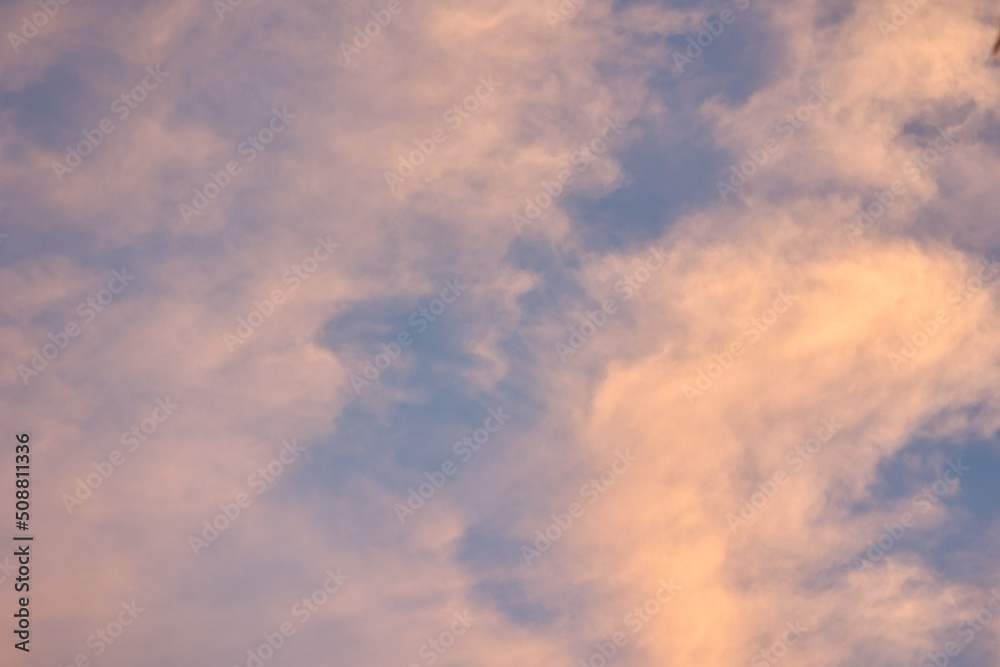 Abstract clouds in the gloden sky during sunset for background.