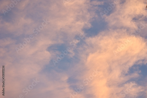 Abstract clouds in the gloden sky during sunset for background. © Eve