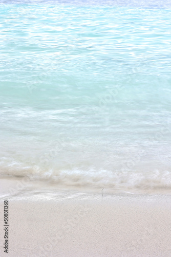 Turquoise sea with sand beach for summer background.
