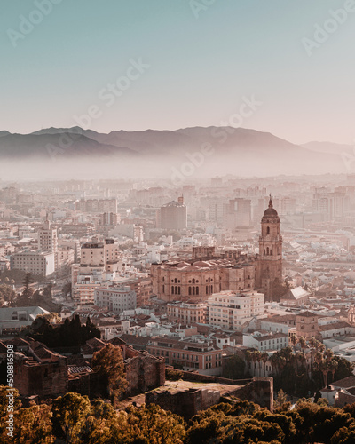Photography Malaga, Spain in the afternoon sun with mountains in the background