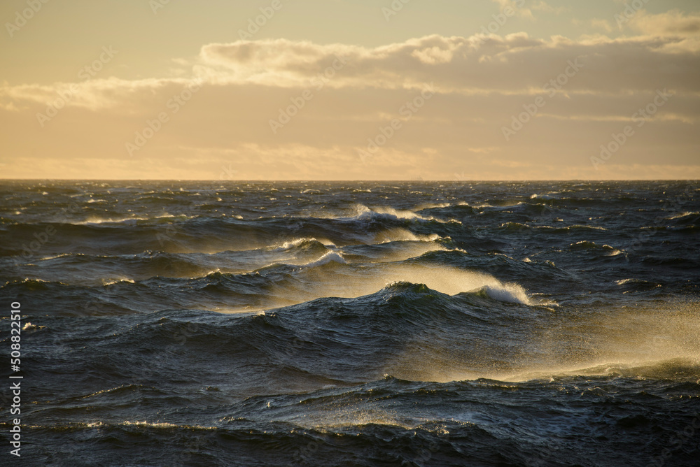 Beautiful seascape waves and sky with clouds with beautiful lighting. Golden hour. Beautiful seascape waves and sky with clouds with beautiful lighting. Golden hour.