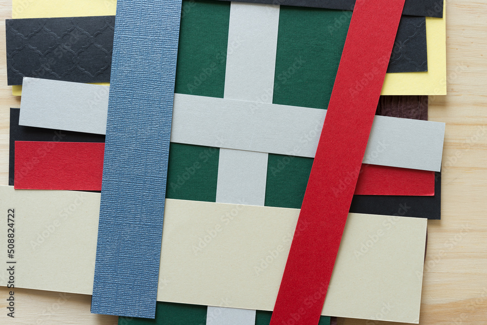 Fototapeta premium stack of paper stripes on wood