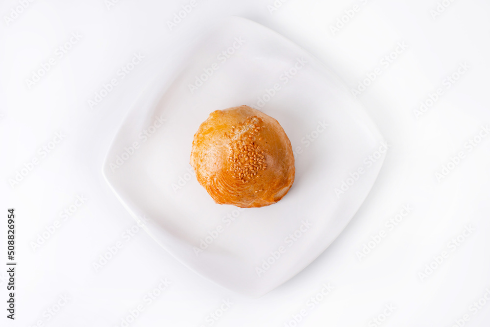 samsa in a white plate on a white background samsa in a white plate on a white background