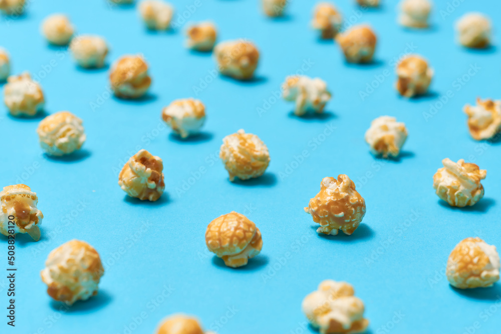 Popcorn candy in pop art style on a blue background Popcorn candy in pop art style on a blue background