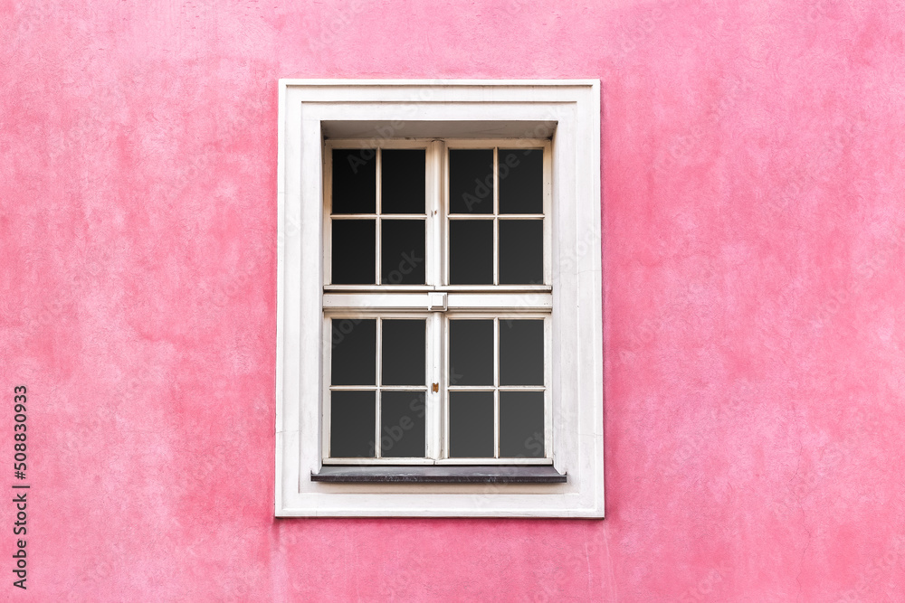 Renaissance style window on pink wall color Renaissance style window on pink wall color
