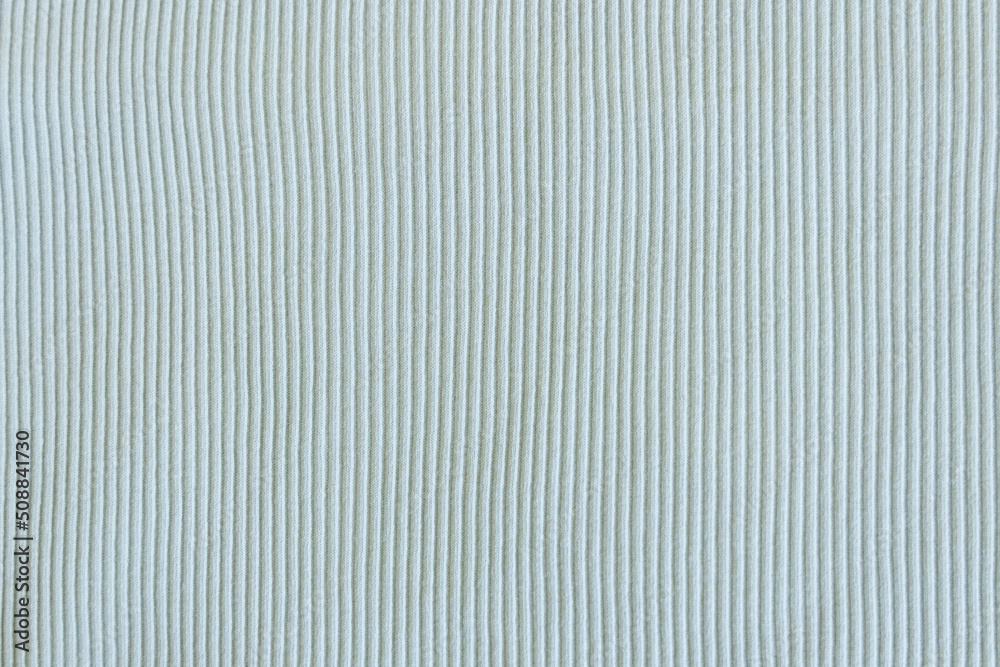 Light green, blue, mint show texture of ribbed cotton fabric wave. Close  up. Cotton clothing and textiles. Natural organic fabrics texture light  Stock Photo