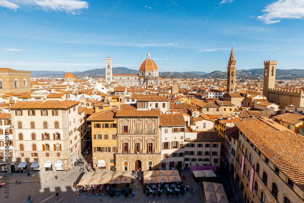 Aerial view on the old town of Florence with famous Duomo cathedral on skyline on sunny day. Outstanding cityscape of tuscany. View from Vecchio palace
