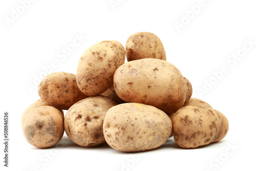 Heap of raw potatoes isolated on white background with clipping path