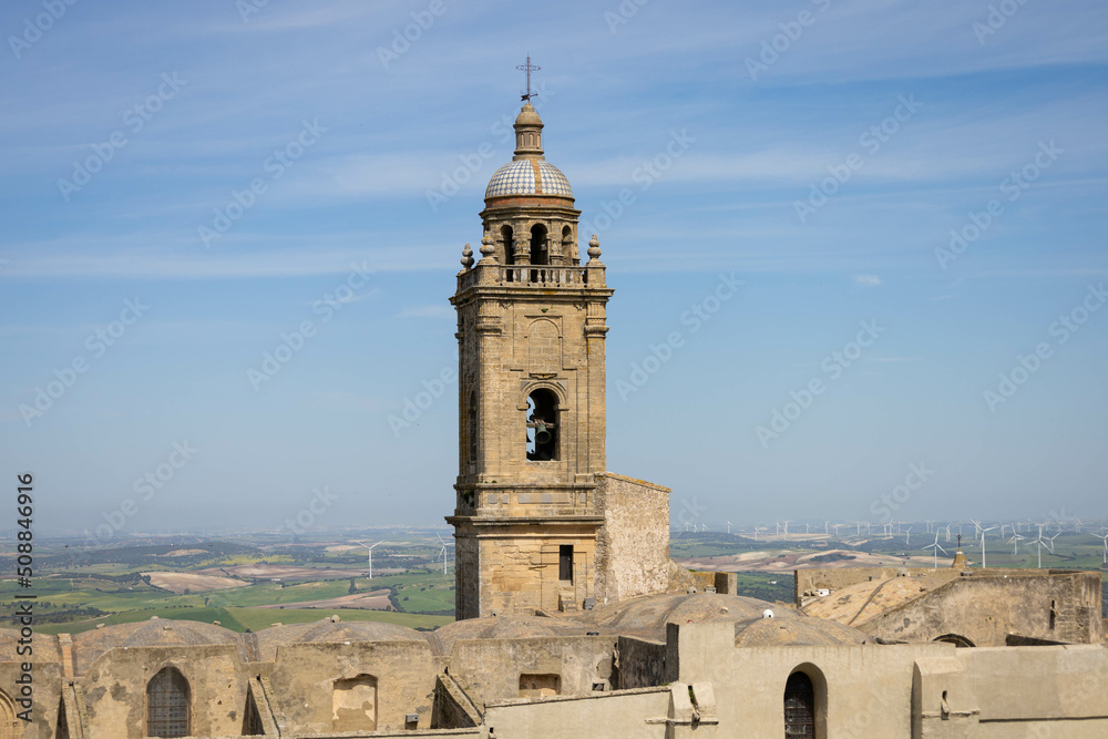 Typical Spanish brown village with bell tower and blue sky. Medina Sidonia, Cadiz, Andalusia, Spain, Europe.