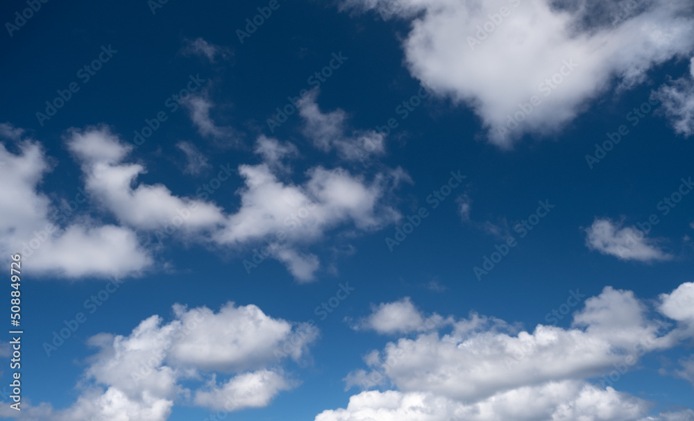 blue sky and white puffy clouds blue sky and white puffy clouds