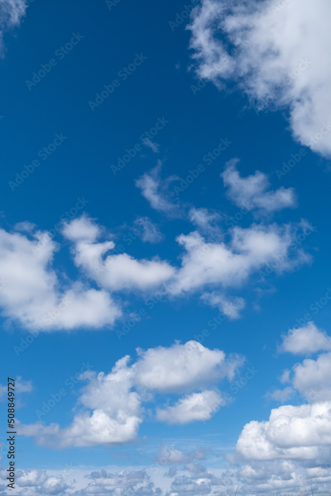blue sky and white puffy clouds blue sky and white puffy clouds