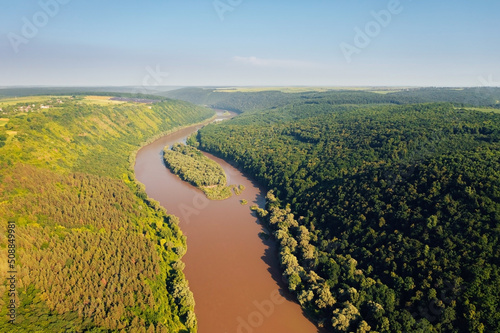 Shooting from a drone with a view of the winding canyon of the Dniester River. Ukraine, Europe.