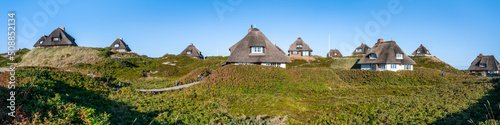Traditional thatched roof houses in summer, Hörnum, Sylt, Schleswig-Holstein, Germany