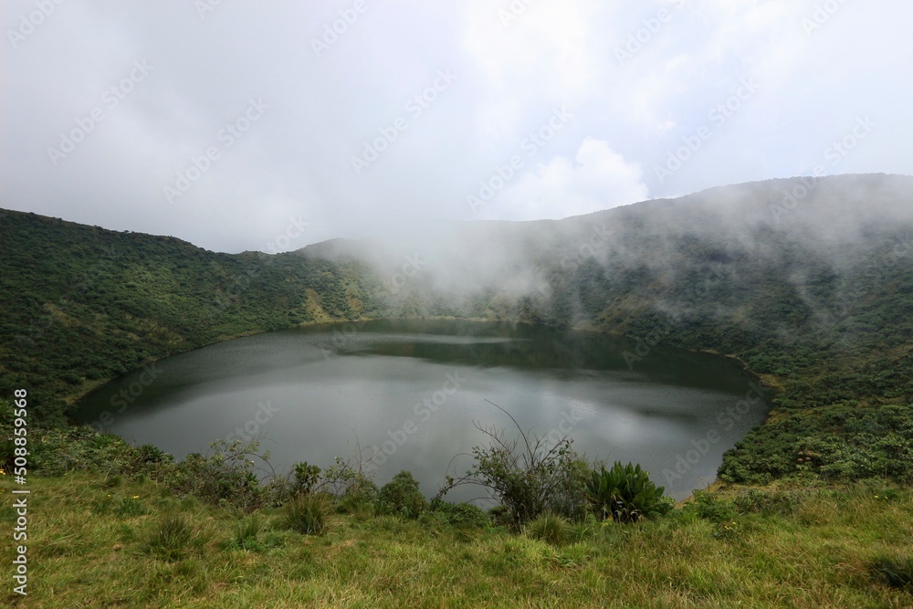 rainbow in the fog crater lake bisoke volcano in rwanda rainbow in the fog crater lake bisoke volcano in rwanda