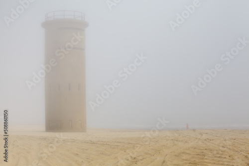 Walking By Guardtower In Rehoboth Beach Fog photo