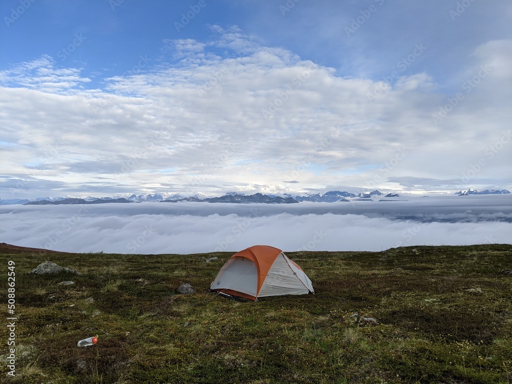 tent outside Denali blue sky