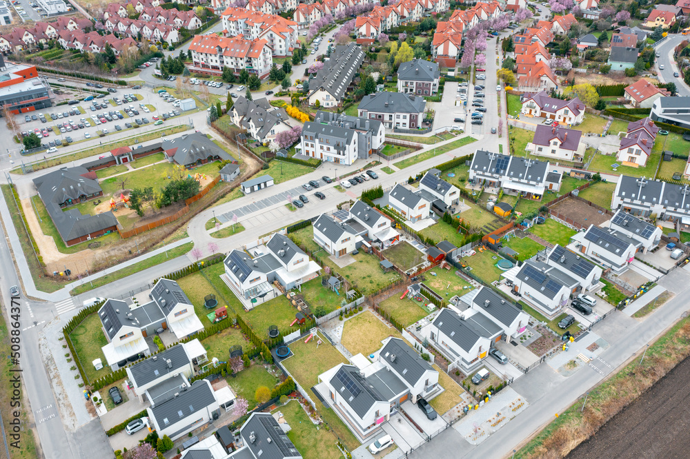 Naklejka premium Panoramic view from a height of a private area with residential buildings, many private houses