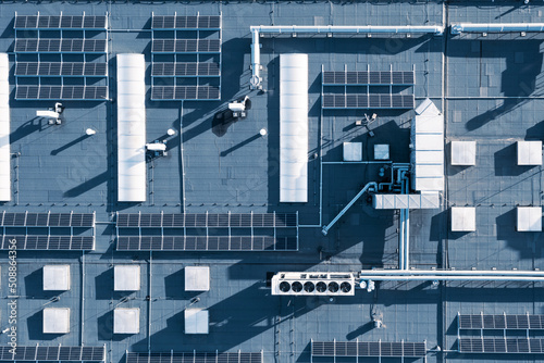 Air conditioning system on the roof of the building, advanced air conditioning and ventilation system, aerial view down the roof of the house, many different ventilation ducts