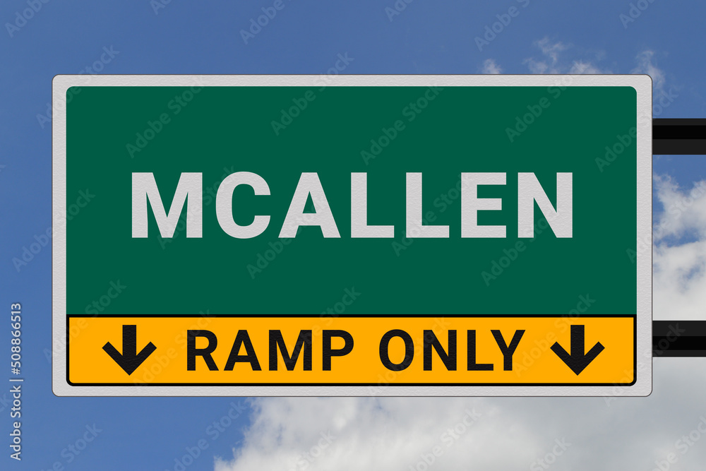 McAllen logo. McAllen lettering on a road sign. Signpost at entrance to McAllen, USA. Green pointer in American style. Road sign in the United States of America. Sky in background