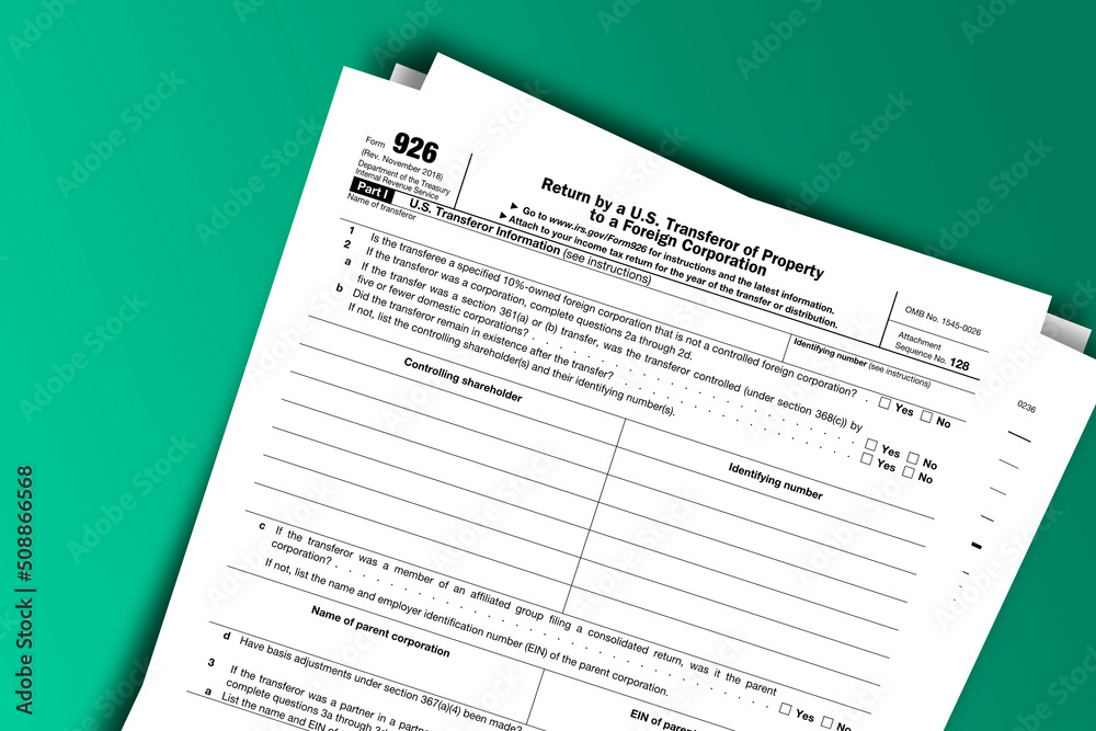 Form 926 documentation published IRS USA 43171. American tax document on colored Form 926 documentation published IRS USA 43171. American tax document on colored