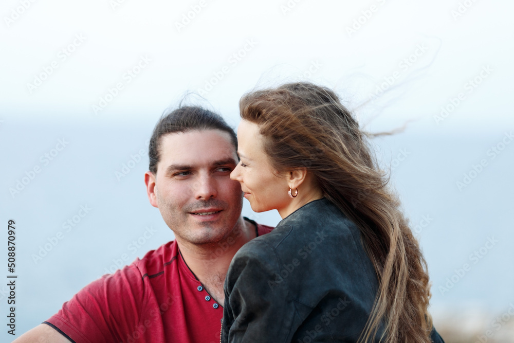 Portrait of lovely middle-aged couple looking on each other and hugging . Portrait of lovely middle-aged couple looking on each other and hugging .