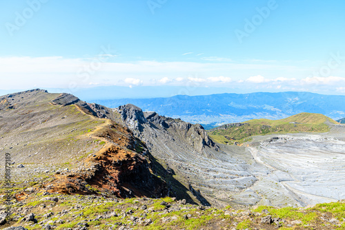 登山道から見た初夏の阿蘇山一帯　熊本県阿蘇市　The area around Mt. Aso in early summer as seen from Takadake. Kumamoto-ken Aso city. photo