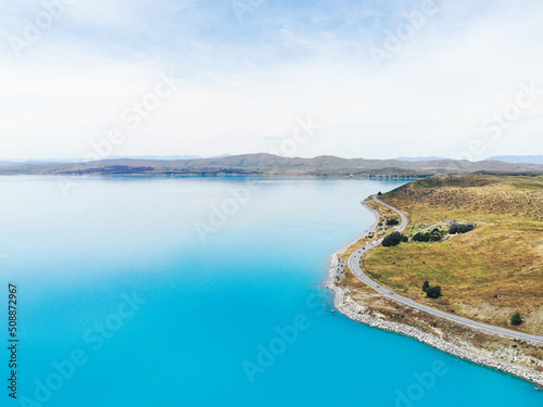 Aerial photography of Blue Lake Pukaki. Beautiful New Zealand landscape background. Road. Nature. Silence