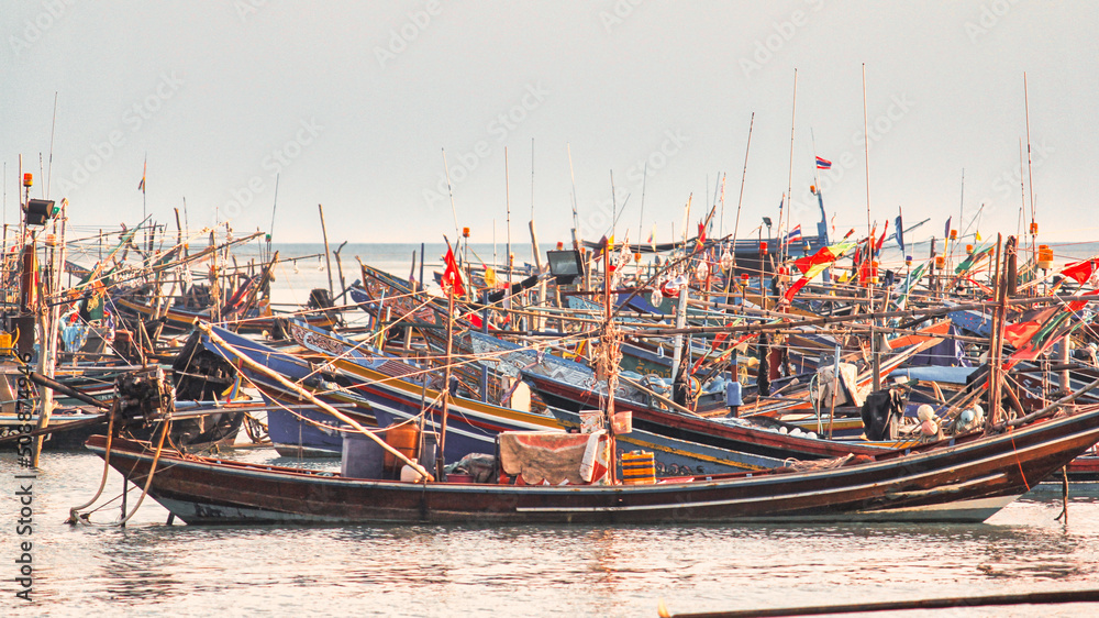 Fishing boats floating in the calm seas are a way of life in Asia. Fishing boats floating in the calm seas are a way of life in Asia.