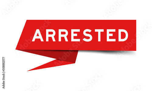 Red color paper speech banner with word arrested on white background