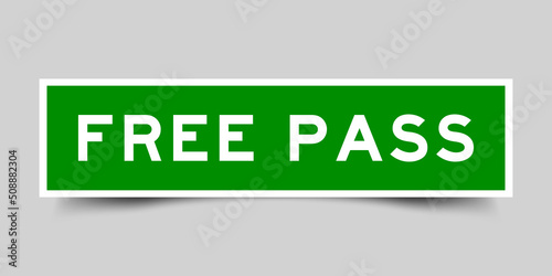 Sticker label with word free pass in green color on gray background