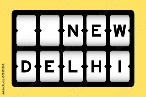 Black color in word new delhi on slot banner with yellow color background