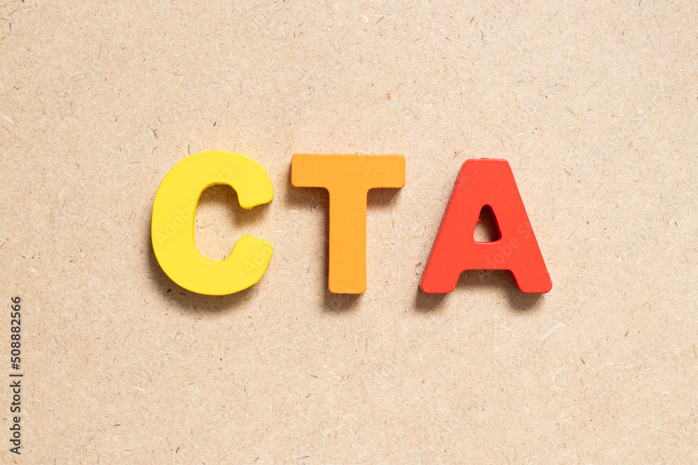 Color alphabet letter in word CTA (Abbreviation of Call to action or Chartered tax adviser) on wood background