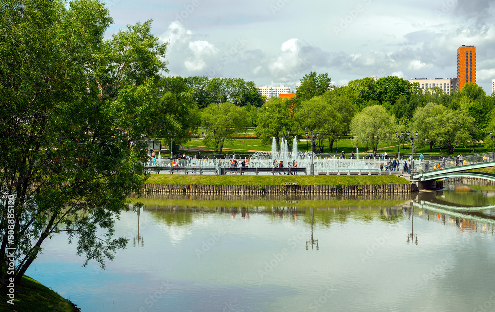 Fototapeta premium Musical fountain. Pedestrian bridge. Tsaritsyno park. Russia May 2022