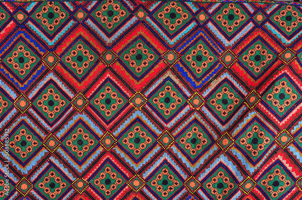 old Ukrainian embroidery in ornaments and patterns embroidered on a canvas